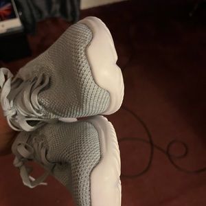 Woman’s gray shoes